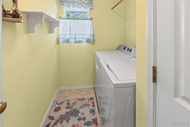 829 Clemson Ave, Fairview Heights, IL 62208 - laundry room featuring washer and clothes dryer and baseboards