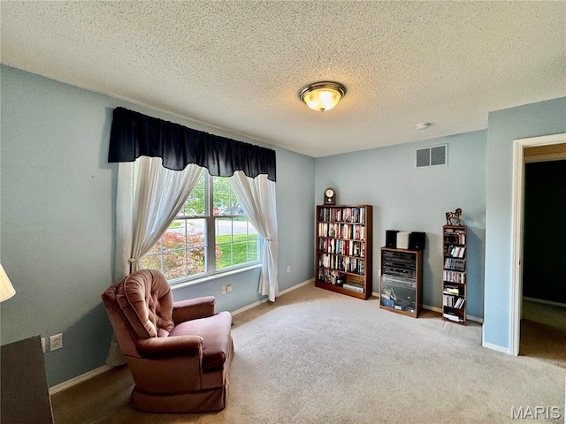 829 Clemson Ave, Fairview Heights, IL 62208 - living area with carpet floors and a textured ceiling