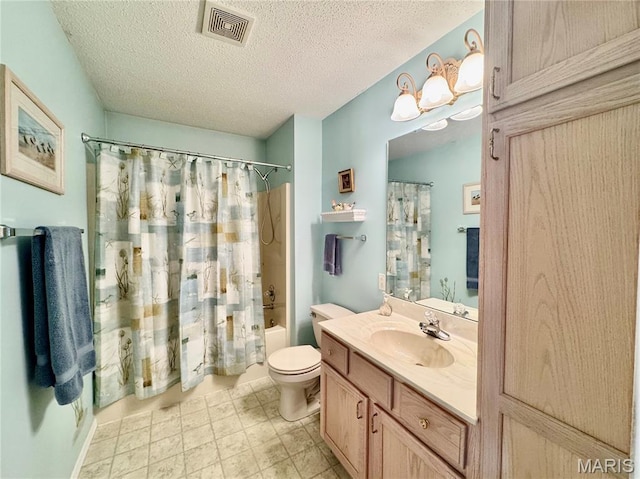 829 Clemson Ave, Fairview Heights, IL 62208 - bathroom featuring vanity, shower / bathtub combination with curtain, and a textured ceiling