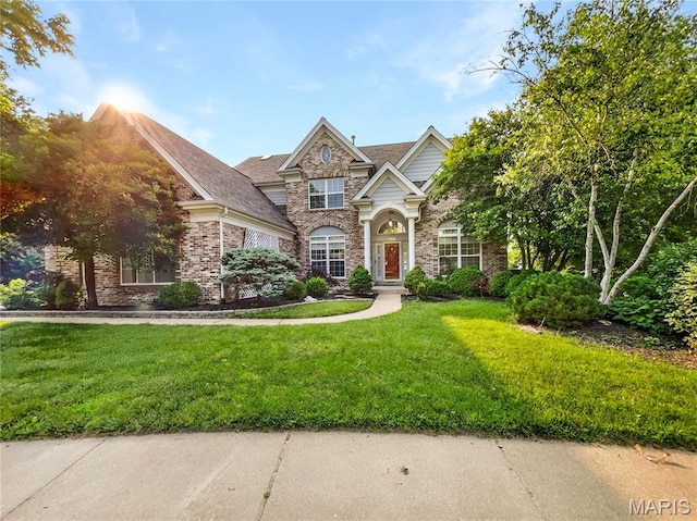 596 Eagle Manor Ln, Chesterfield, MO 63017 - view of front of property with stone siding and a front lawn