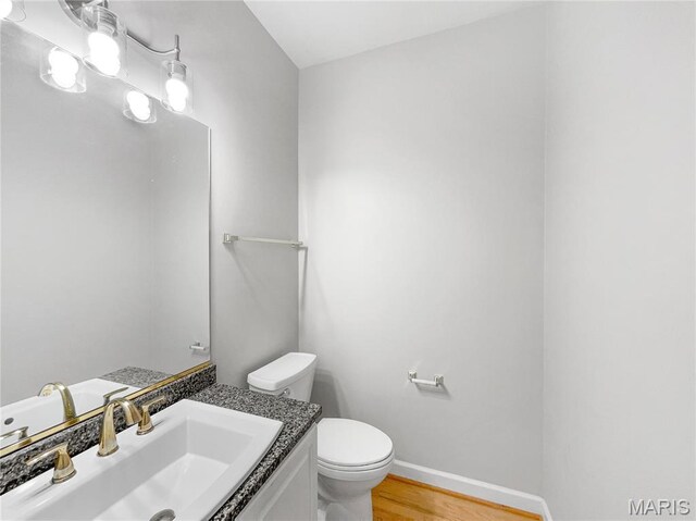 596 Eagle Manor Ln, Chesterfield, MO 63017 - bathroom with vanity and wood finished floors