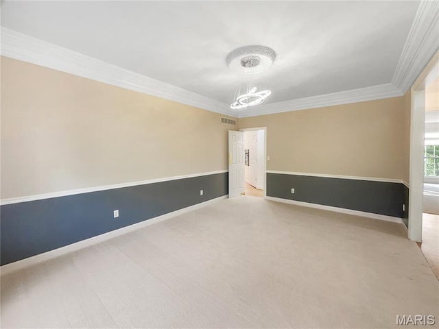 596 Eagle Manor Ln, Chesterfield, MO 63017 - spare room featuring a chandelier, light colored carpet, and crown molding