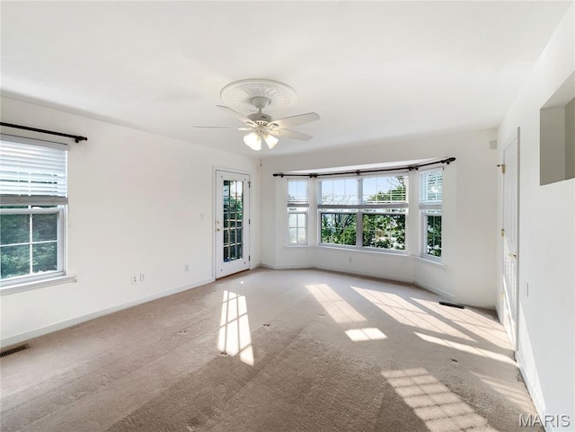 596 Eagle Manor Ln, Chesterfield, MO 63017 - spare room with carpet floors and a ceiling fan