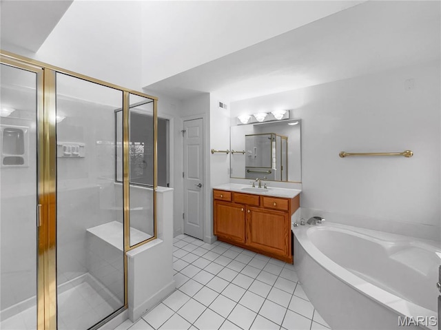 596 Eagle Manor Ln, Chesterfield, MO 63017 - full bath featuring vanity, a garden tub, a stall shower, and tile patterned floors