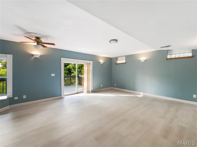 596 Eagle Manor Ln, Chesterfield, MO 63017 - spare room with light wood finished floors and a ceiling fan