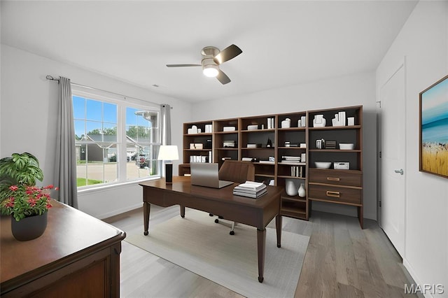 1575 Hickory Lndg, De Soto, MO 63020 - office space featuring a ceiling fan and light wood finished floors