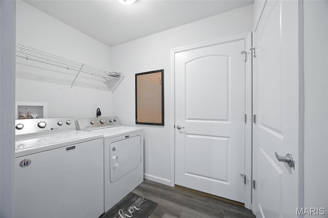1575 Hickory Lndg, De Soto, MO 63020 - washroom featuring washing machine and dryer and dark wood-style flooring