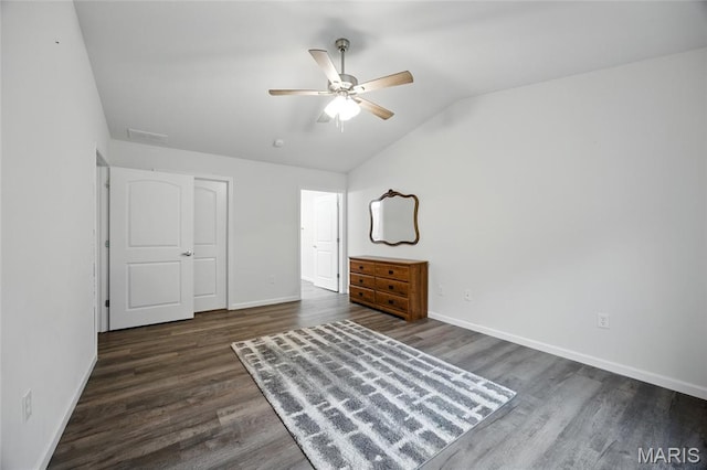 1575 Hickory Lndg, De Soto, MO 63020 - unfurnished bedroom featuring vaulted ceiling, dark wood-style floors, and ceiling fan