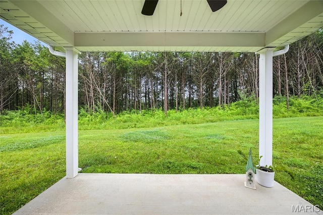 1575 Hickory Lndg, De Soto, MO 63020 - view of grassy yard with ceiling fan and a patio
