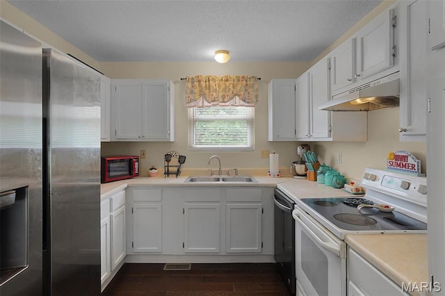 351 Orion Dr, De Soto, MO 63020 - kitchen featuring white range with electric cooktop, stainless steel fridge with ice dispenser, under cabinet range hood, dishwasher, and dark wood finished floors