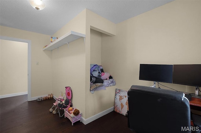 351 Orion Dr, De Soto, MO 63020 - office area with wood finished floors and a textured ceiling