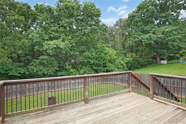 351 Orion Dr, De Soto, MO 63020 - wooden deck with a fenced backyard and a playground