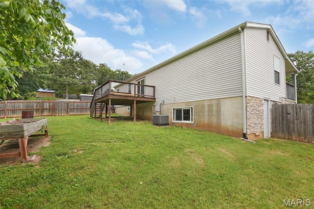 351 Orion Dr, De Soto, MO 63020 - rear view of property with a wooden deck, a fenced backyard, and stairway