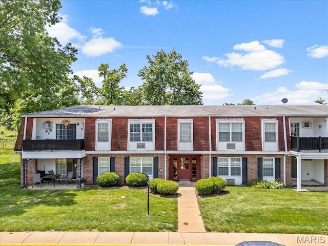 1745 Herault Pl Unit F, Saint Louis, MO 63125 - view of front of house with brick siding and a front lawn