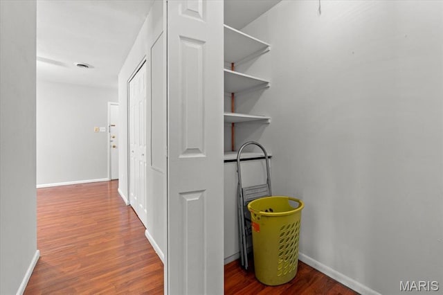1745 Herault Pl Unit F, Saint Louis, MO 63125 - hall with wood finished floors and baseboards