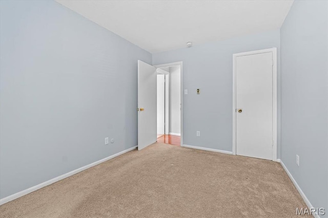 1745 Herault Pl Unit F, Saint Louis, MO 63125 - carpeted spare room with baseboards