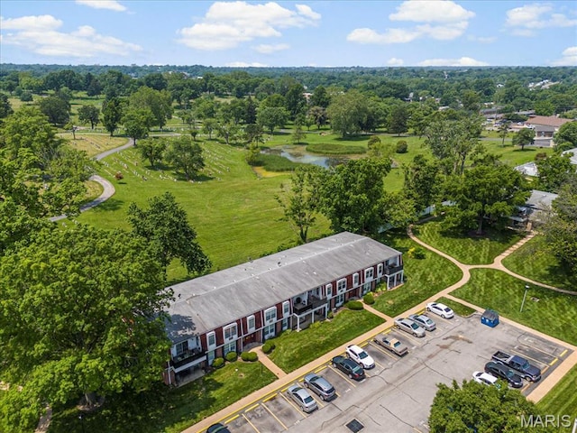 1745 Herault Pl Unit F, Saint Louis, MO 63125 - drone / aerial view of a tree filled landscape and a nearby body of water
