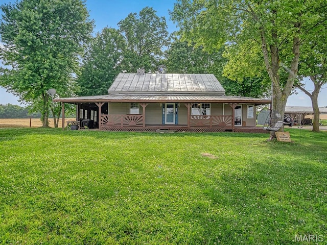1767 Ames Rd, Prairie Du Rocher, IL 62277 - rear view of house with a porch, a lawn, a metal roof, and a standing seam roof