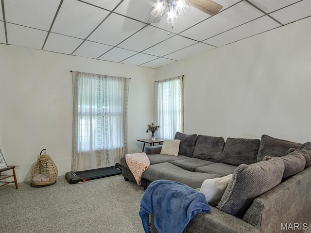 1767 Ames Rd, Prairie Du Rocher, IL 62277 - living area featuring carpet flooring, a ceiling fan, and a paneled ceiling