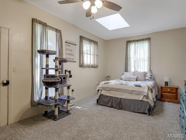 1767 Ames Rd, Prairie Du Rocher, IL 62277 - bedroom with multiple windows, carpet flooring, a skylight, and ceiling fan