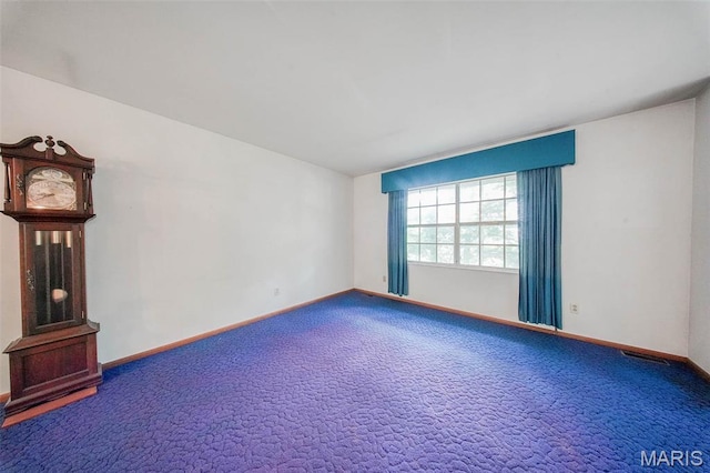 10820 Clayton Ct, Rolla, MO 65401 - carpeted spare room with baseboards
