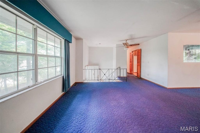 10820 Clayton Ct, Rolla, MO 65401 - spare room featuring plenty of natural light and carpet