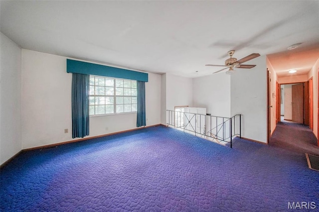 10820 Clayton Ct, Rolla, MO 65401 - carpeted spare room with ceiling fan and a smoke detector