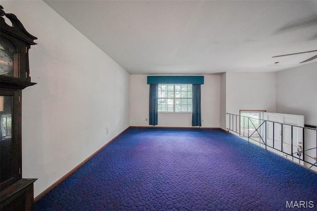10820 Clayton Ct, Rolla, MO 65401 - unfurnished room featuring carpet and ceiling fan