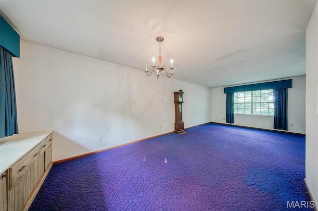 10820 Clayton Ct, Rolla, MO 65401 - empty room featuring a chandelier and carpet flooring