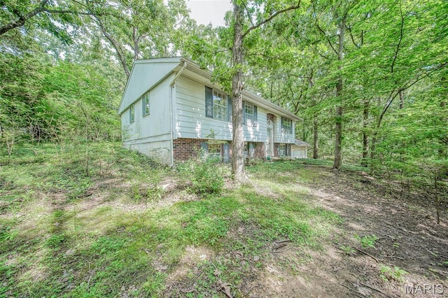 10820 Clayton Ct, Rolla, MO 65401 - view of front of home featuring a view of trees