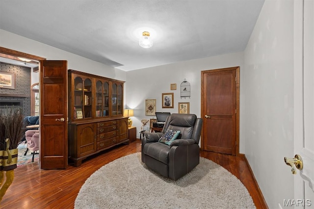 101 E Fairway Dr, Belleville, IL 62223 - living area with dark wood finished floors and a fireplace
