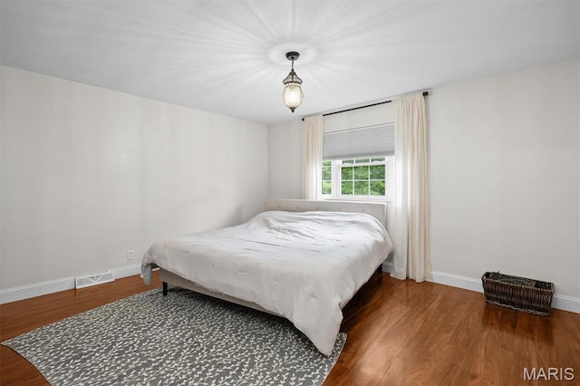 101 E Fairway Dr, Belleville, IL 62223 - bedroom with wood finished floors and baseboards