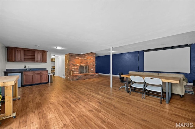 101 E Fairway Dr, Belleville, IL 62223 - home theater with light wood-style floors and a fireplace