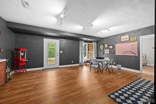 101 E Fairway Dr, Belleville, IL 62223 - dining room with wood finished floors, plenty of natural light, and rail lighting