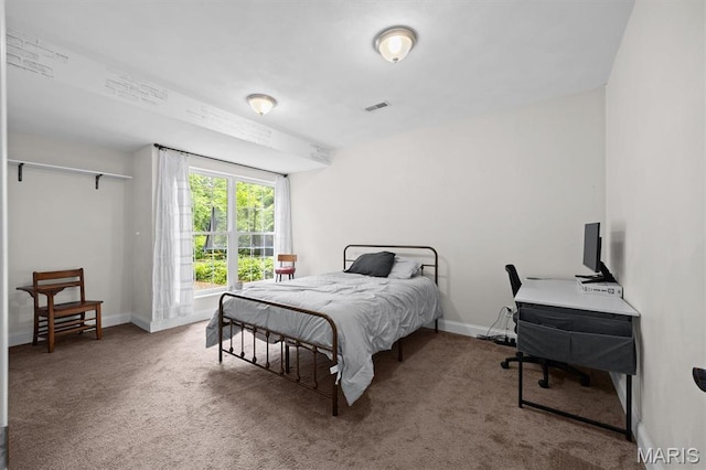101 E Fairway Dr, Belleville, IL 62223 - carpeted bedroom featuring baseboards and an office area