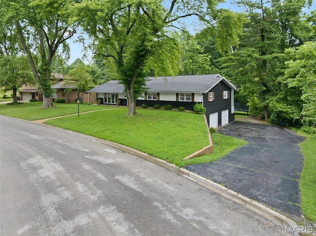 101 E Fairway Dr, Belleville, IL 62223 - ranch-style home with asphalt driveway, an attached garage, and a front yard