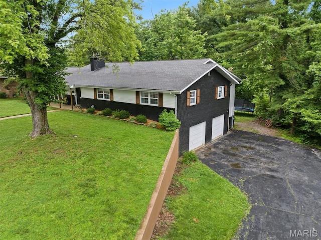 101 E Fairway Dr, Belleville, IL 62223 - ranch-style home with brick siding, driveway, a chimney, a garage, and a front lawn