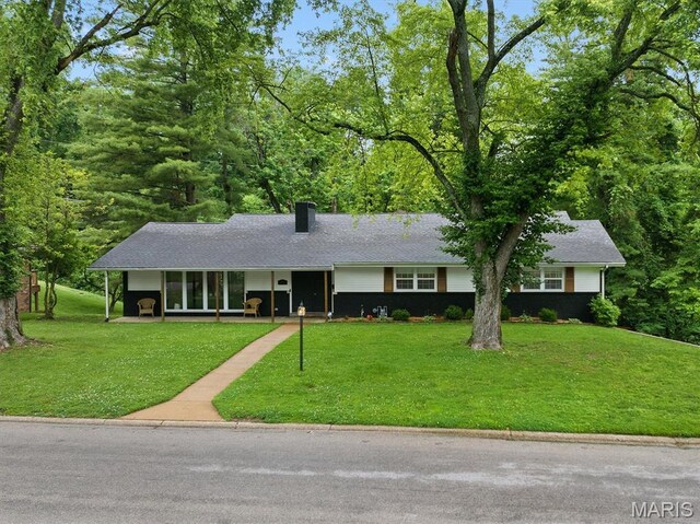 101 E Fairway Dr, Belleville, IL 62223 - view of front of home featuring a chimney and a front lawn