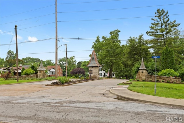 101 E Fairway Dr, Belleville, IL 62223 - view of asphalt road with curbs, street lighting, and sidewalks