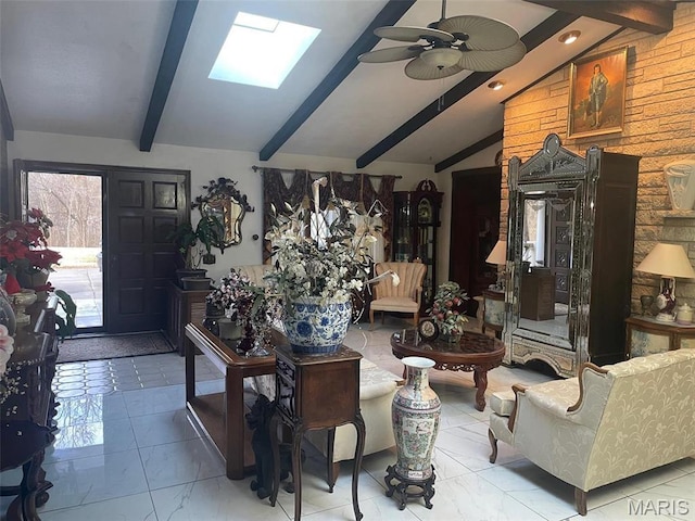 12746 Rolling Hills Dr, Trenton, IL 62293 - living area featuring a skylight, ceiling fan, and light marble finish flooring