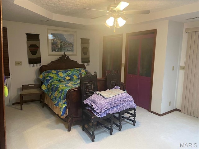 12746 Rolling Hills Dr, Trenton, IL 62293 - bedroom with light carpet, a textured ceiling, ceiling fan, and a closet