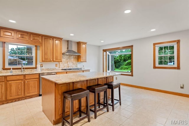 10 Rio Vista Dr, Frontier Township, MO 63303 - kitchen featuring wall chimney exhaust hood, stainless steel dishwasher, gas cooktop, healthy amount of natural light, and recessed lighting