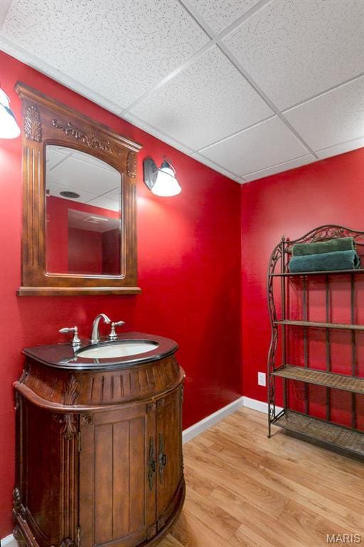 10 Rio Vista Dr, Frontier Township, MO 63303 - bathroom with wood finished floors, vanity, and a paneled ceiling