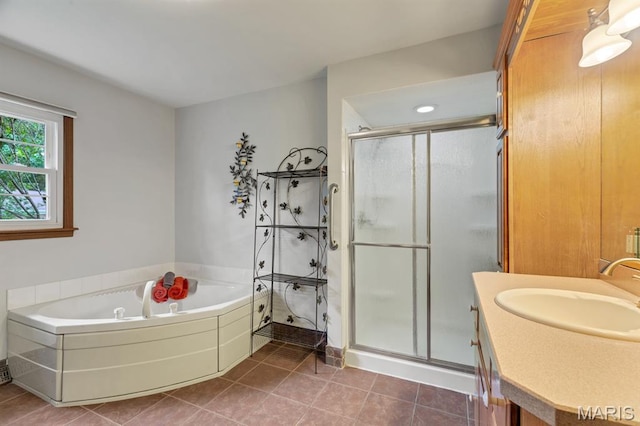 10 Rio Vista Dr, Frontier Township, MO 63303 - full bathroom featuring a stall shower, a garden tub, tile patterned floors, and vanity