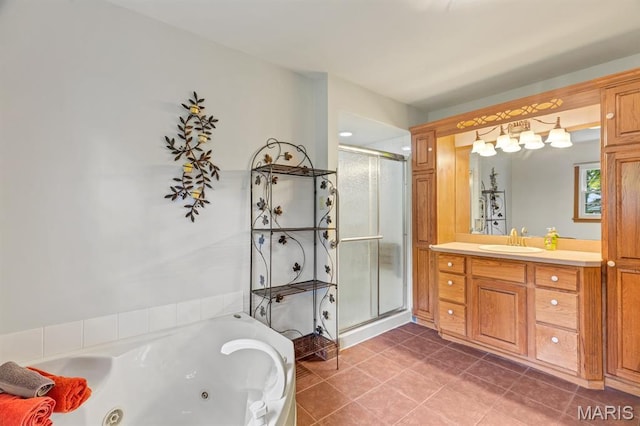 10 Rio Vista Dr, Frontier Township, MO 63303 - bathroom featuring vanity, a shower stall, a jetted tub, and tile patterned floors