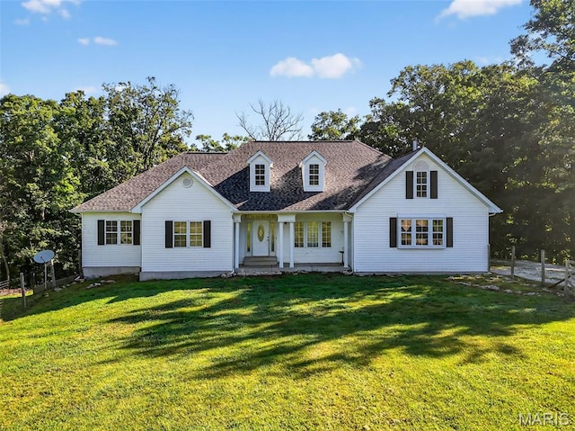 23827 Falcon Ridge Rd, Warrenton, MO 63383 - cape cod-style house with a front lawn