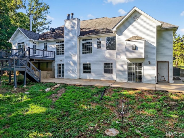 23827 Falcon Ridge Rd, Warrenton, MO 63383 - rear view of property with a patio, a wooden deck, stairs, a chimney, and a lawn
