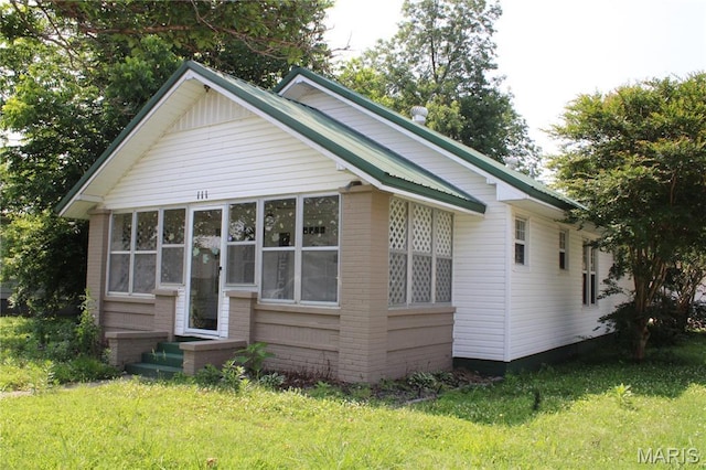 111 W Broadway St, Hayti, MO 63851 - view of front facade with a front yard