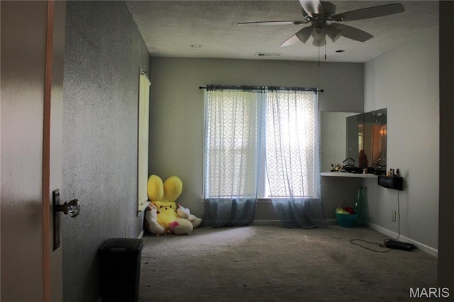111 W Broadway St, Hayti, MO 63851 - spare room with carpet floors and ceiling fan