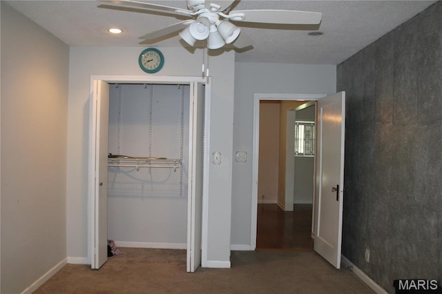 111 W Broadway St, Hayti, MO 63851 - unfurnished bedroom featuring carpet, a closet, and ceiling fan